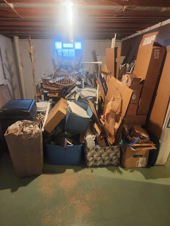 Roll-off dumpster container at job site for 4 Yard Dumpster Rental in Temple Hills